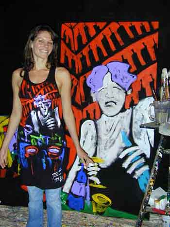 Leila Sack modelling E.J. Gold's JazzArt Woman in a Room racerback dress with the painting that inspired it